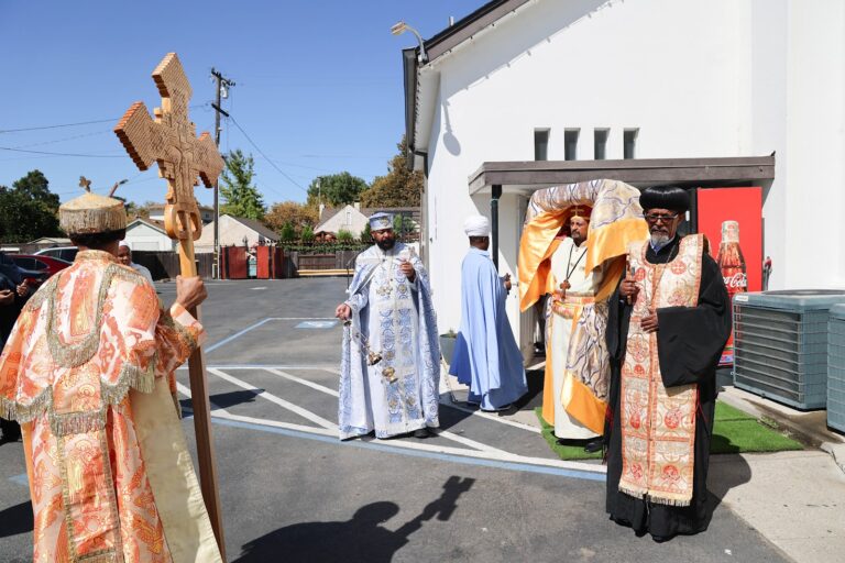 The processional cross carried outside the church